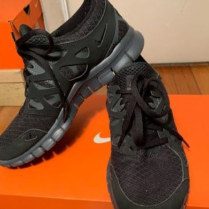 All black Nike sneakers